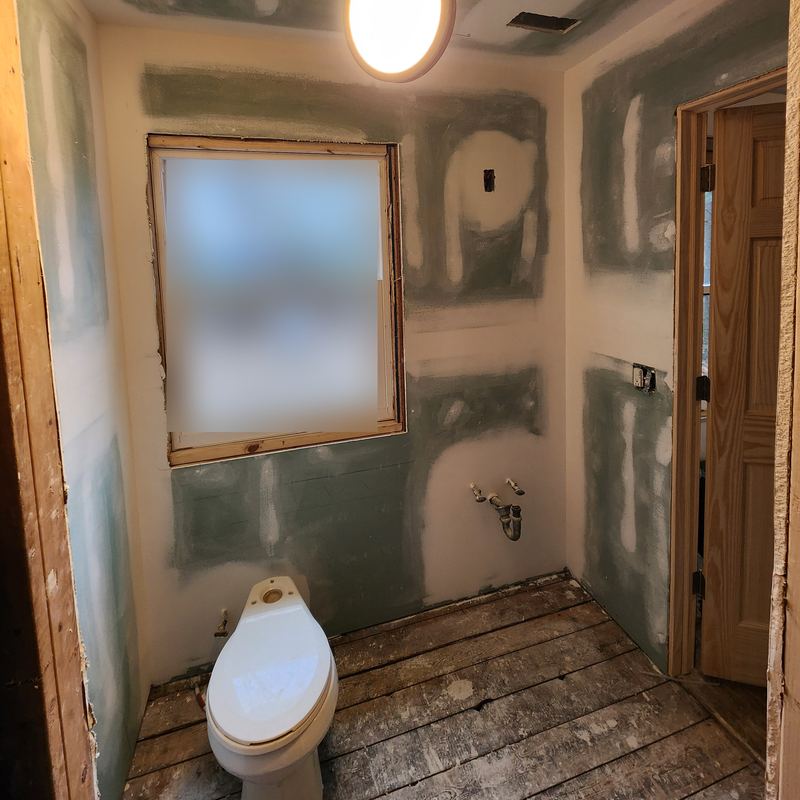 New drywall taped and mudded around the window