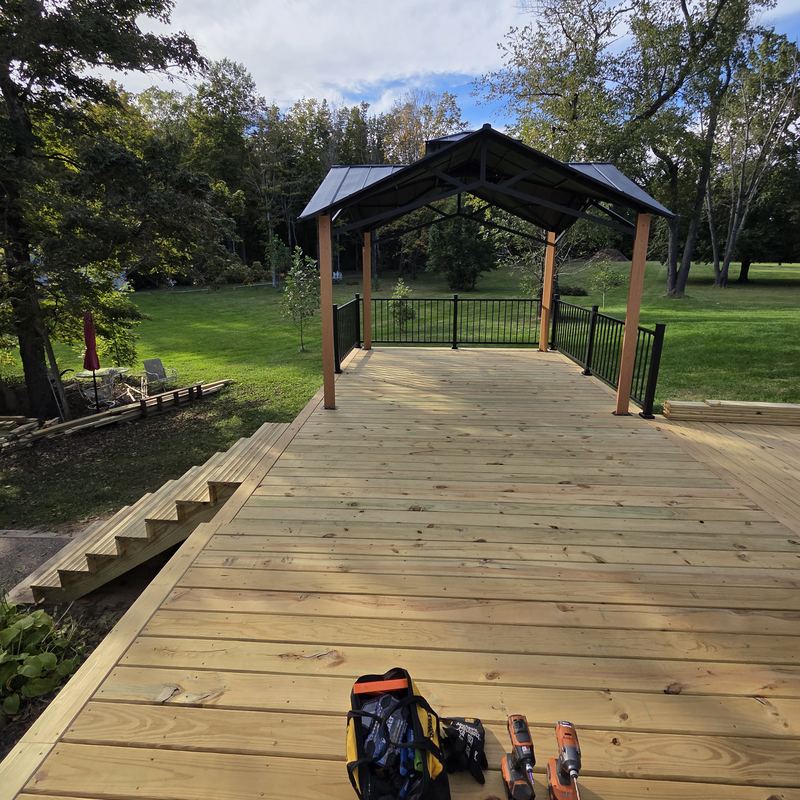 New deck boards down under the pergola, tools still out